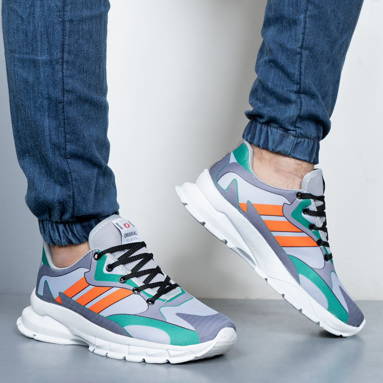 کفش ورزشی Adidas مردانه نارنجی مدل Tacha