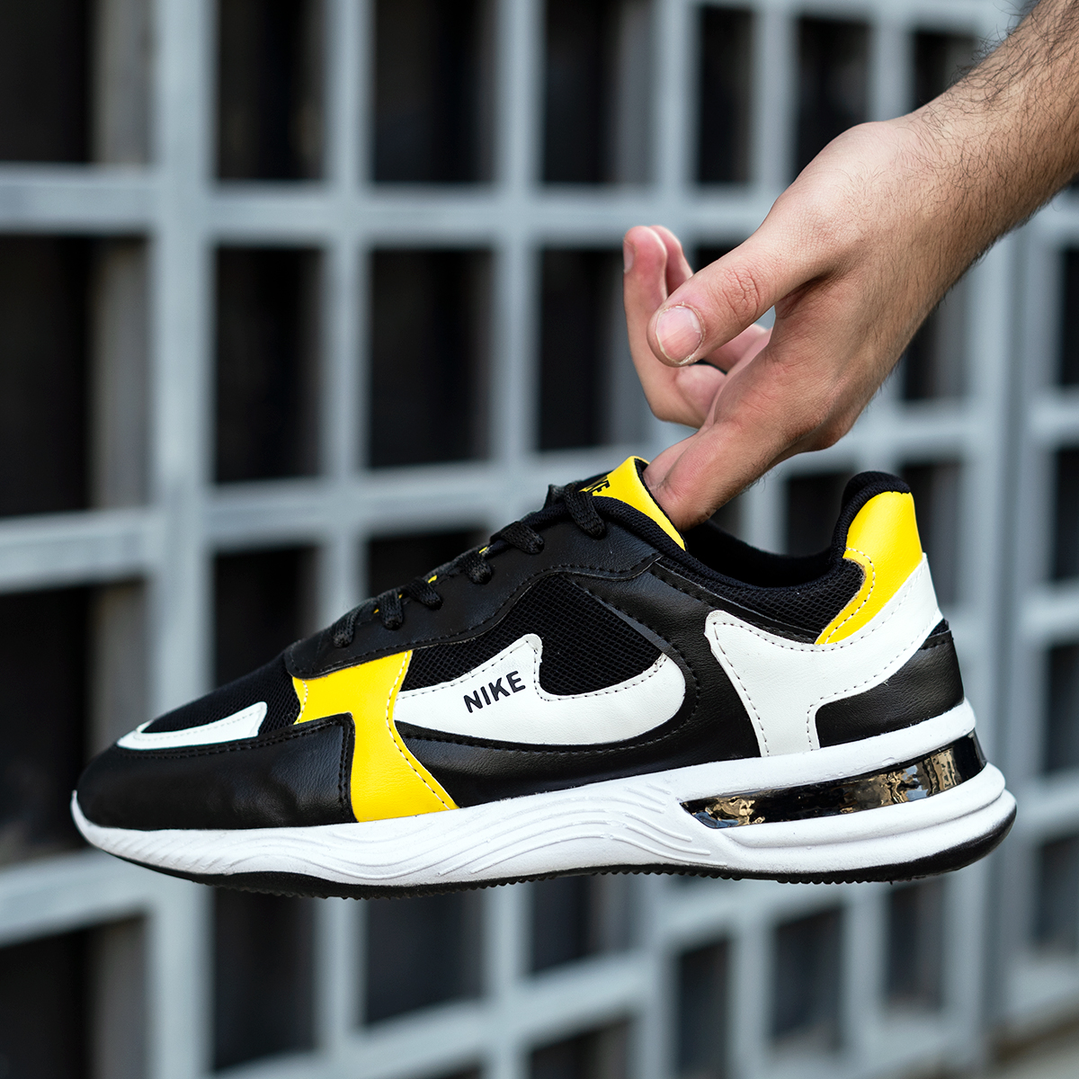 کفش ورزشی Nike مردانه مشکی زرد مدلJimi