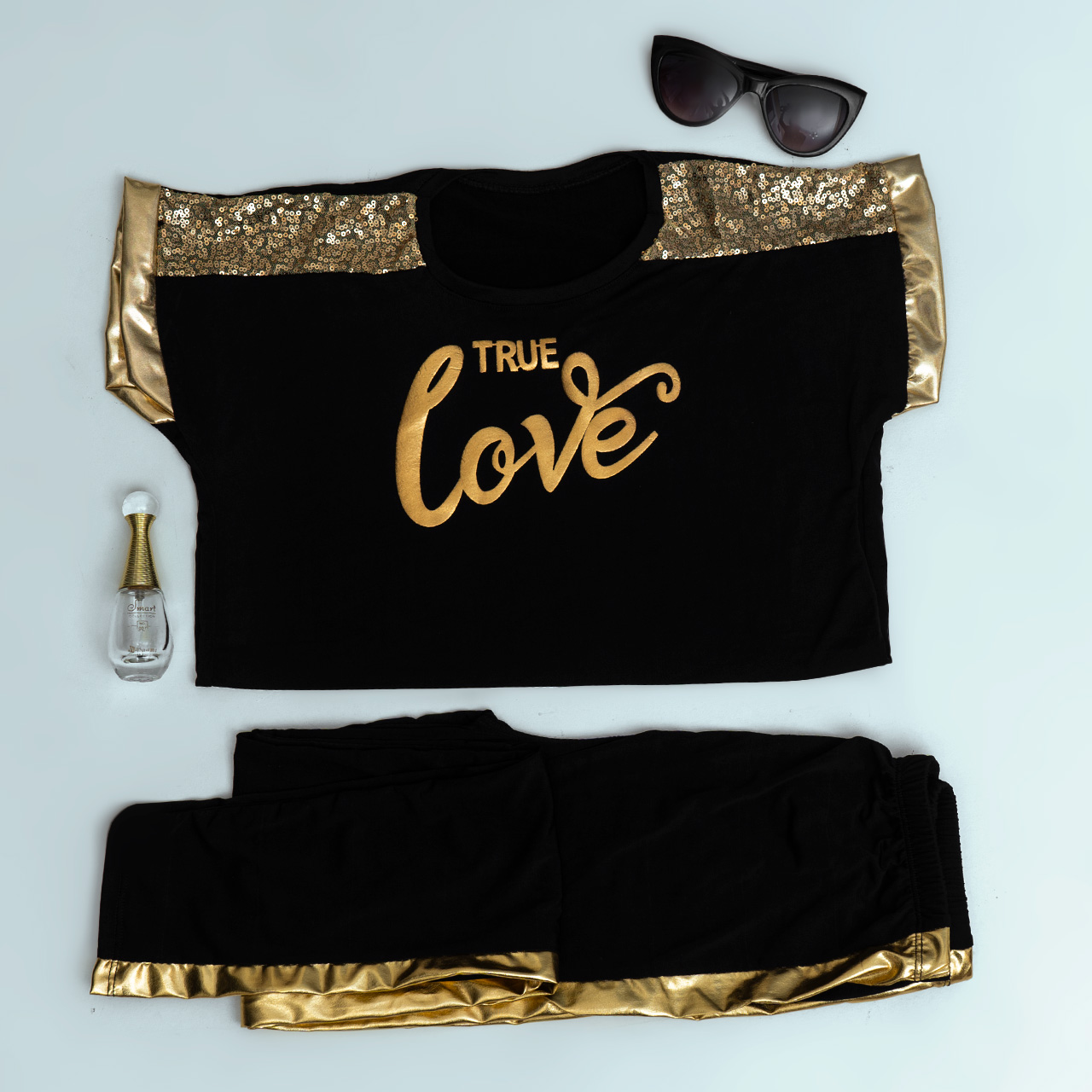 ست تیشرت و شلوار love دخترانه طلایی مدل Raha