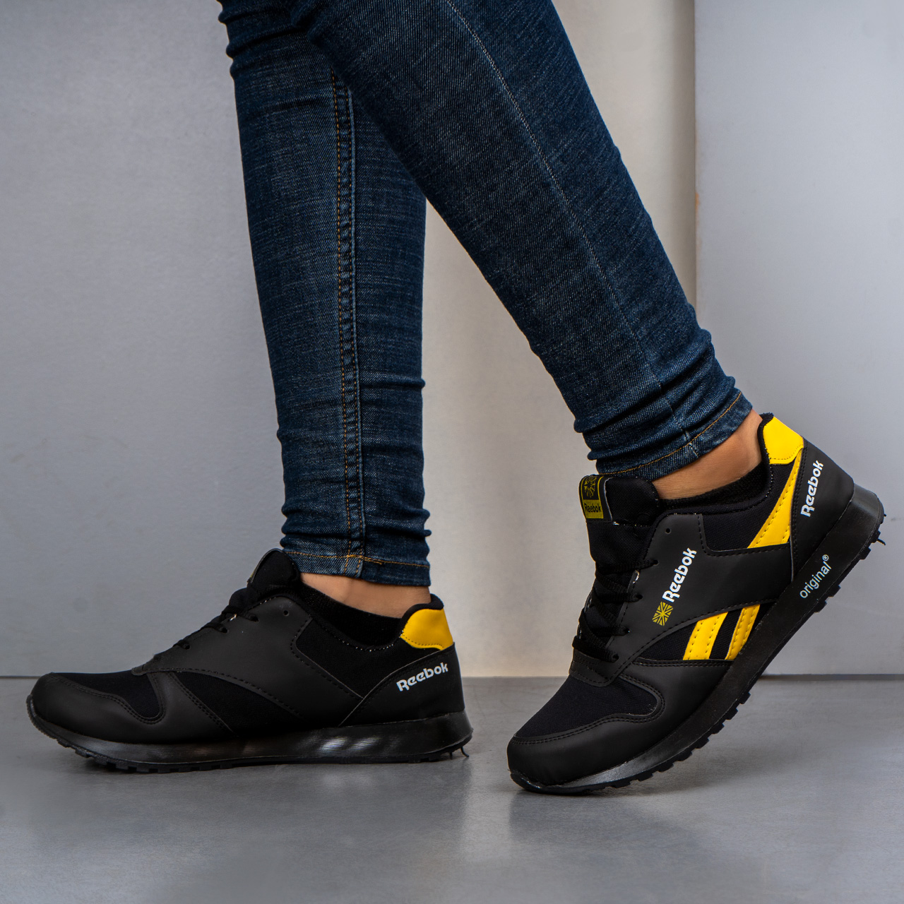 کفش ورزشی Reebok مشکی زرد مردانه مدلRako