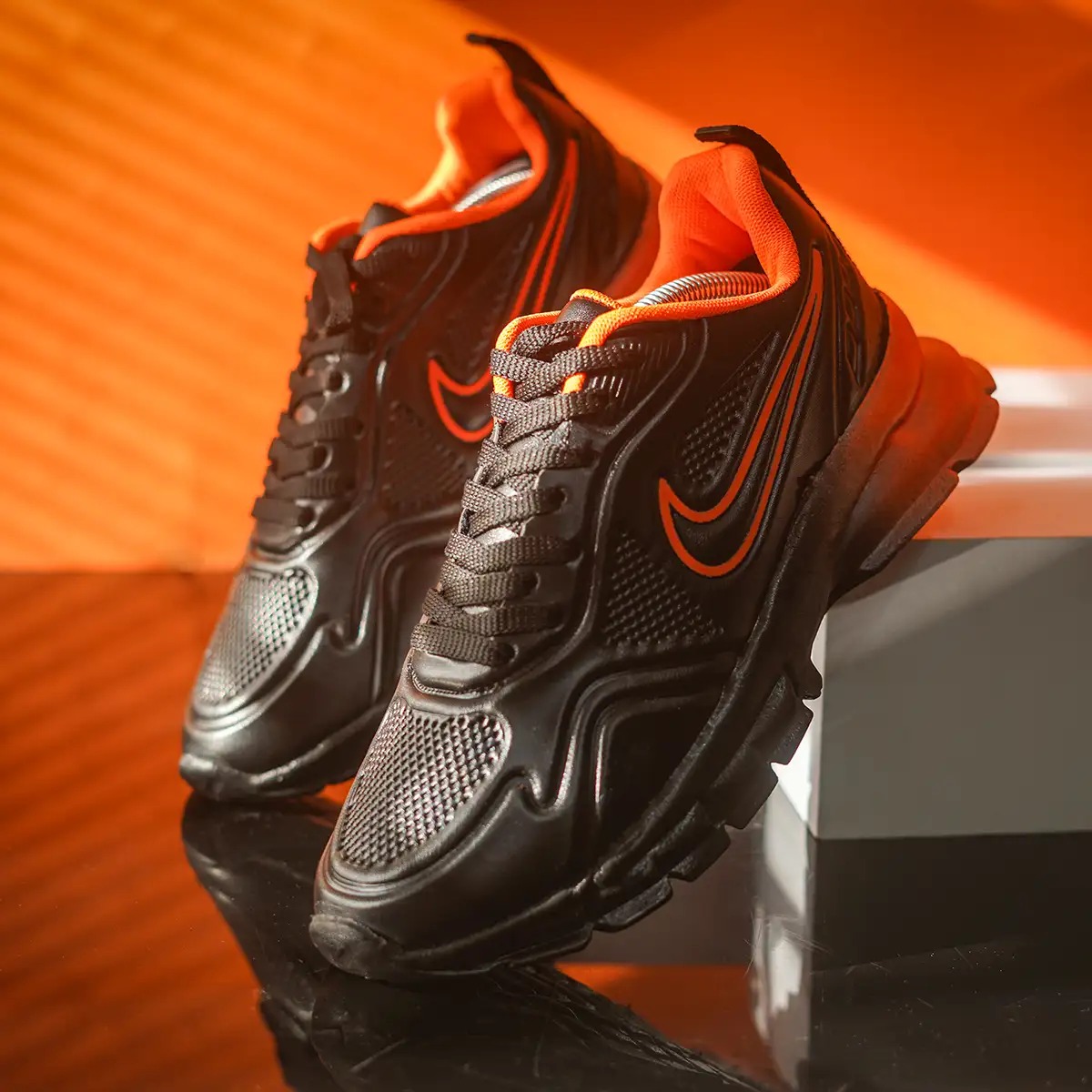 کفش ورزشی مردانه مشکی نارنجی مدل Arona